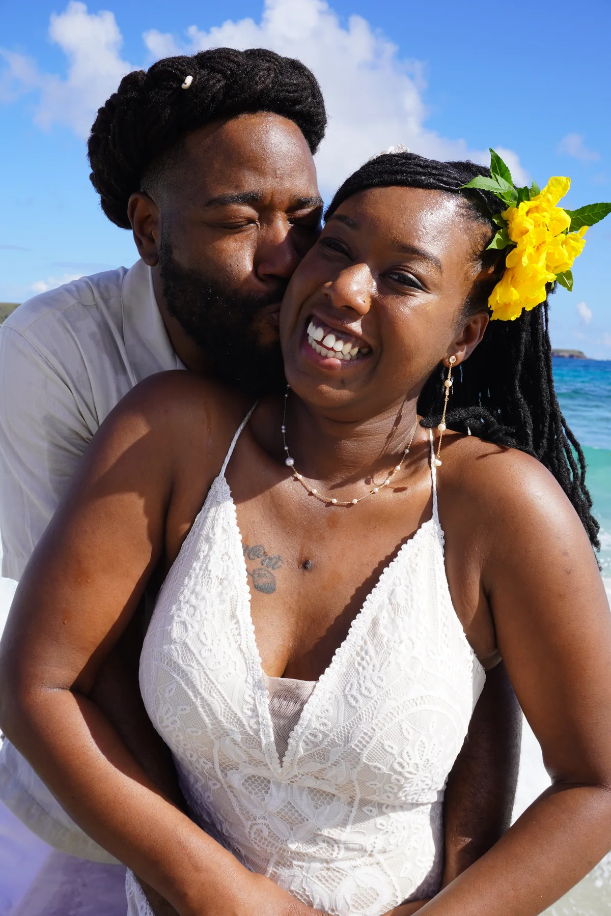 Bride and groom portrait on the beach